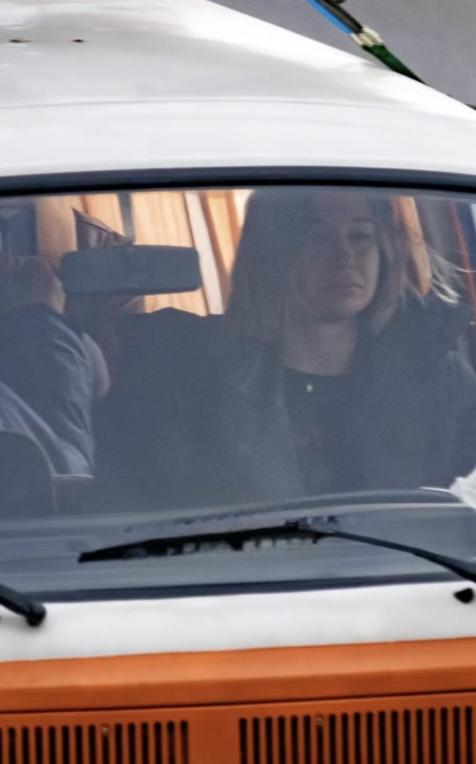 Jessica Biel seen through the windscreen of the orange VW T2 during filming